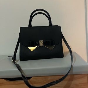 Cute black crossbody bag with gold detail
